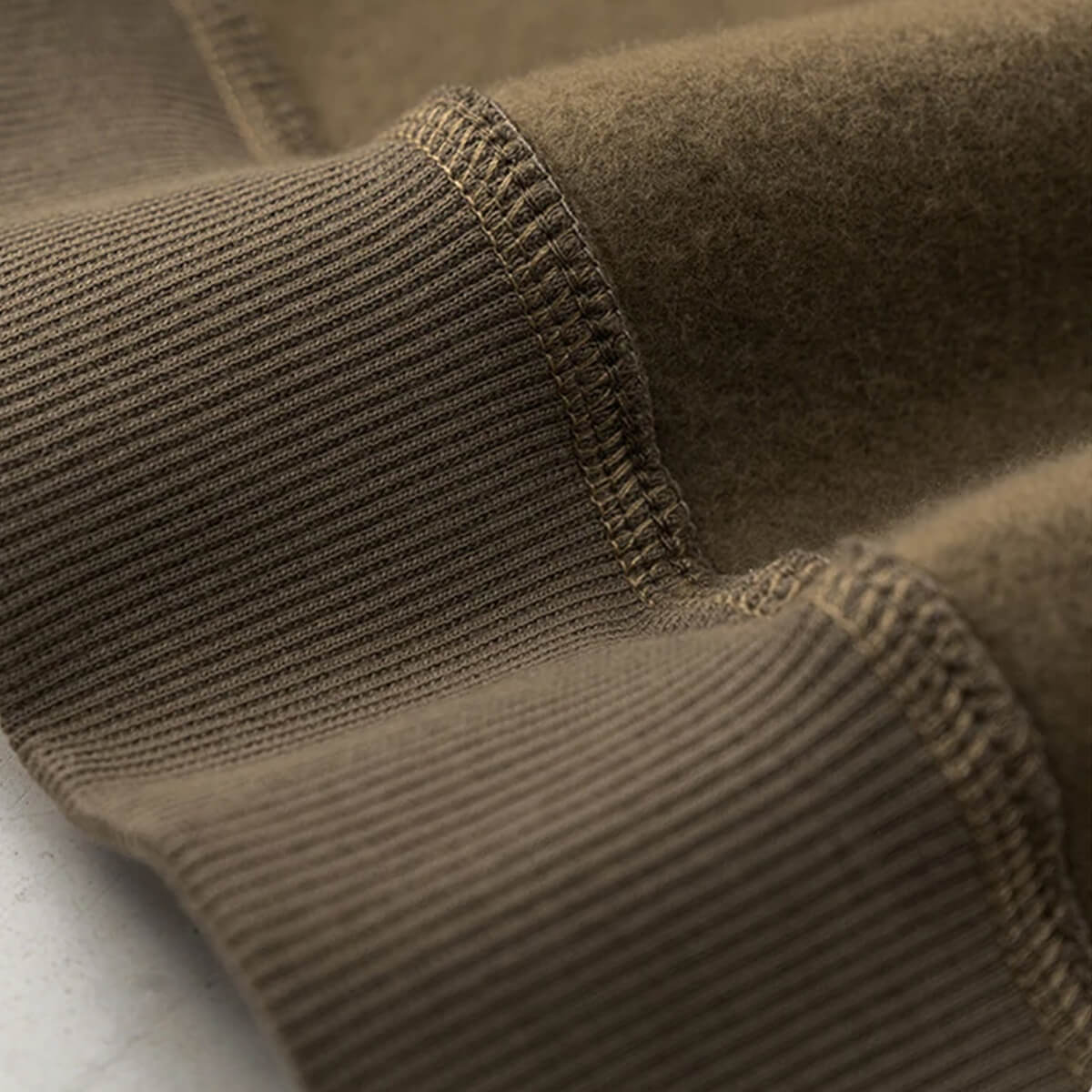 Close-up of the ultra-soft fleece lining on the Caelur hoodie