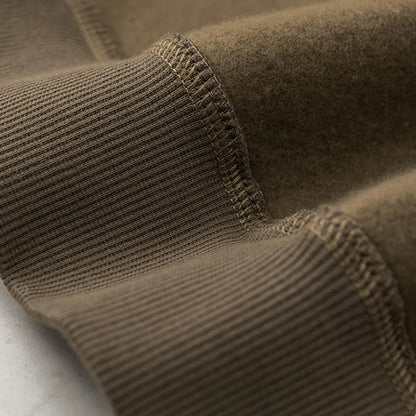 Close-up of the ultra-soft fleece lining on the Caelur hoodie